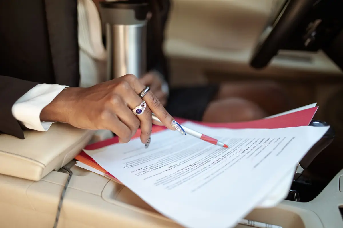 A professional reviewing legal documents
